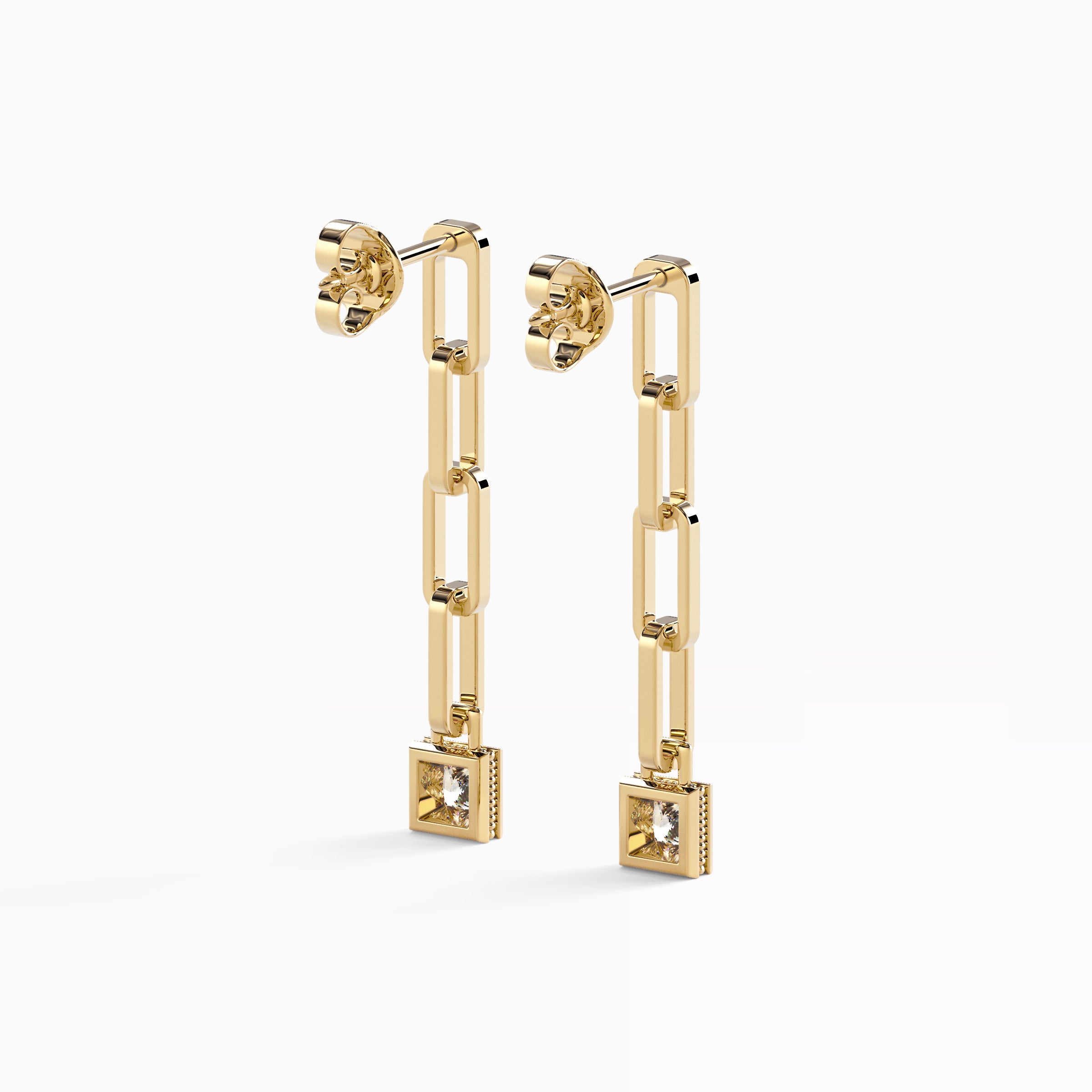 Boucles d'oreilles pendantes en forme de trombone serties de diamants | Or 18 carats