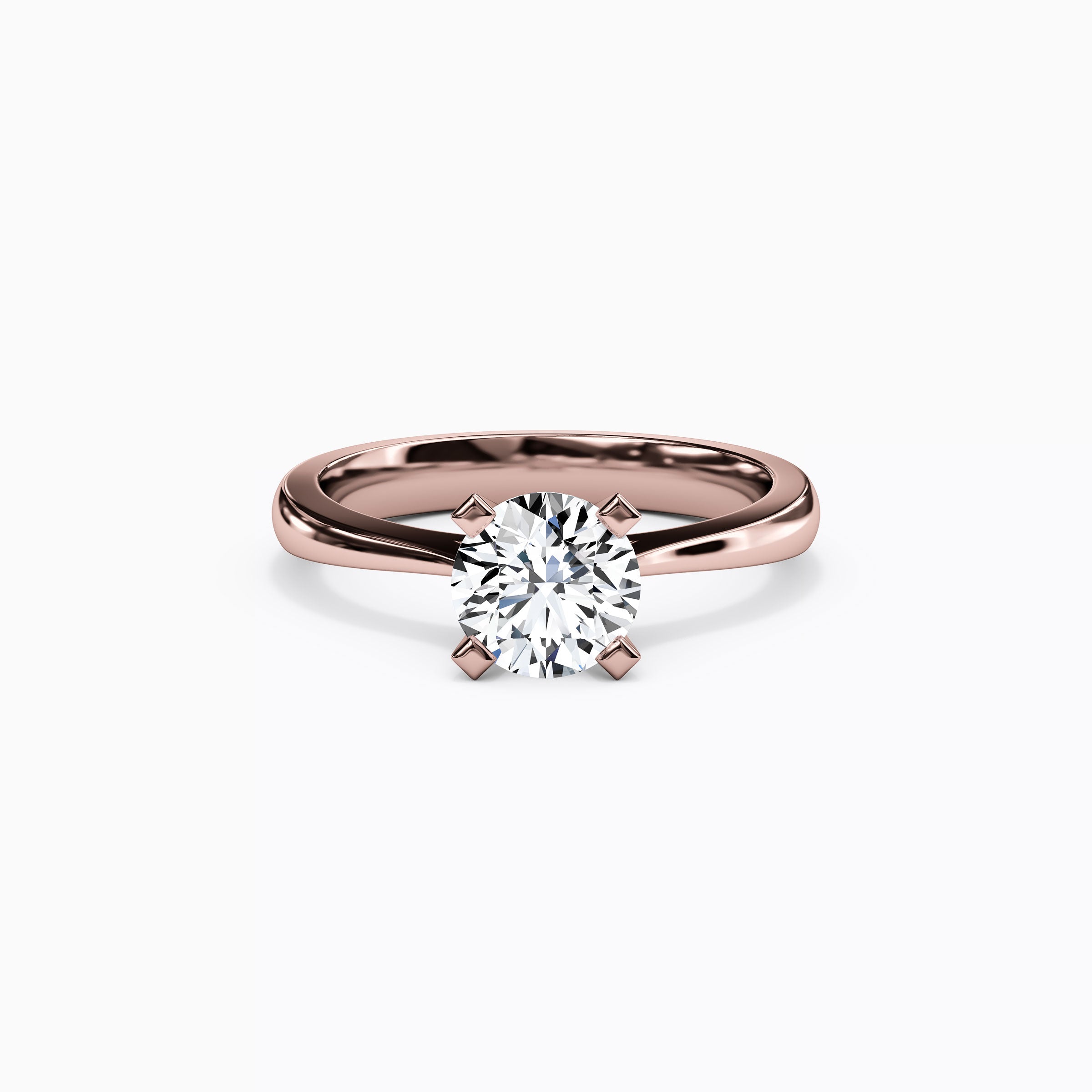 Bague de fiançailles solitaire en or 18 carats avec diamant rond.