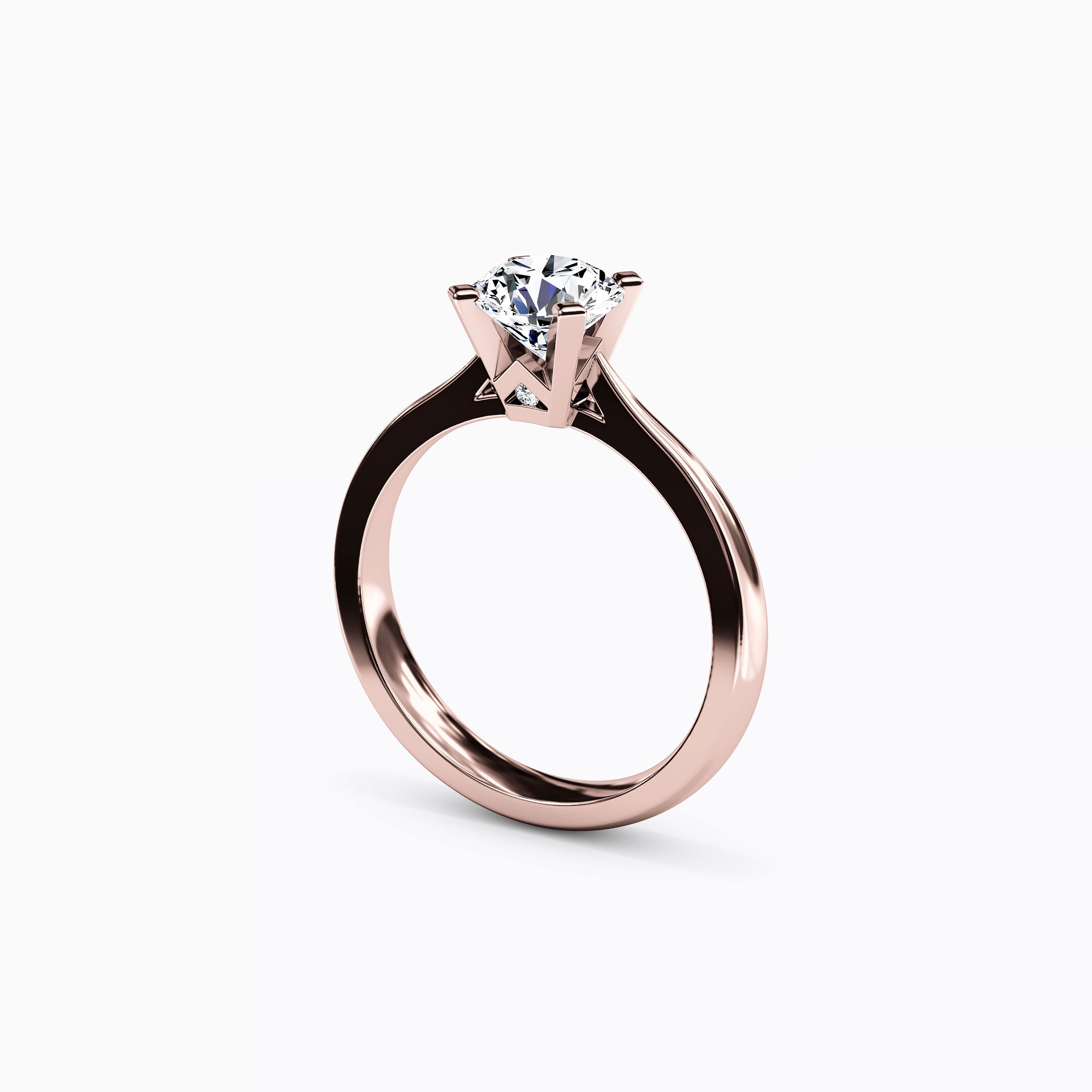 Bague de fiançailles solitaire en or 18 carats avec diamant rond.