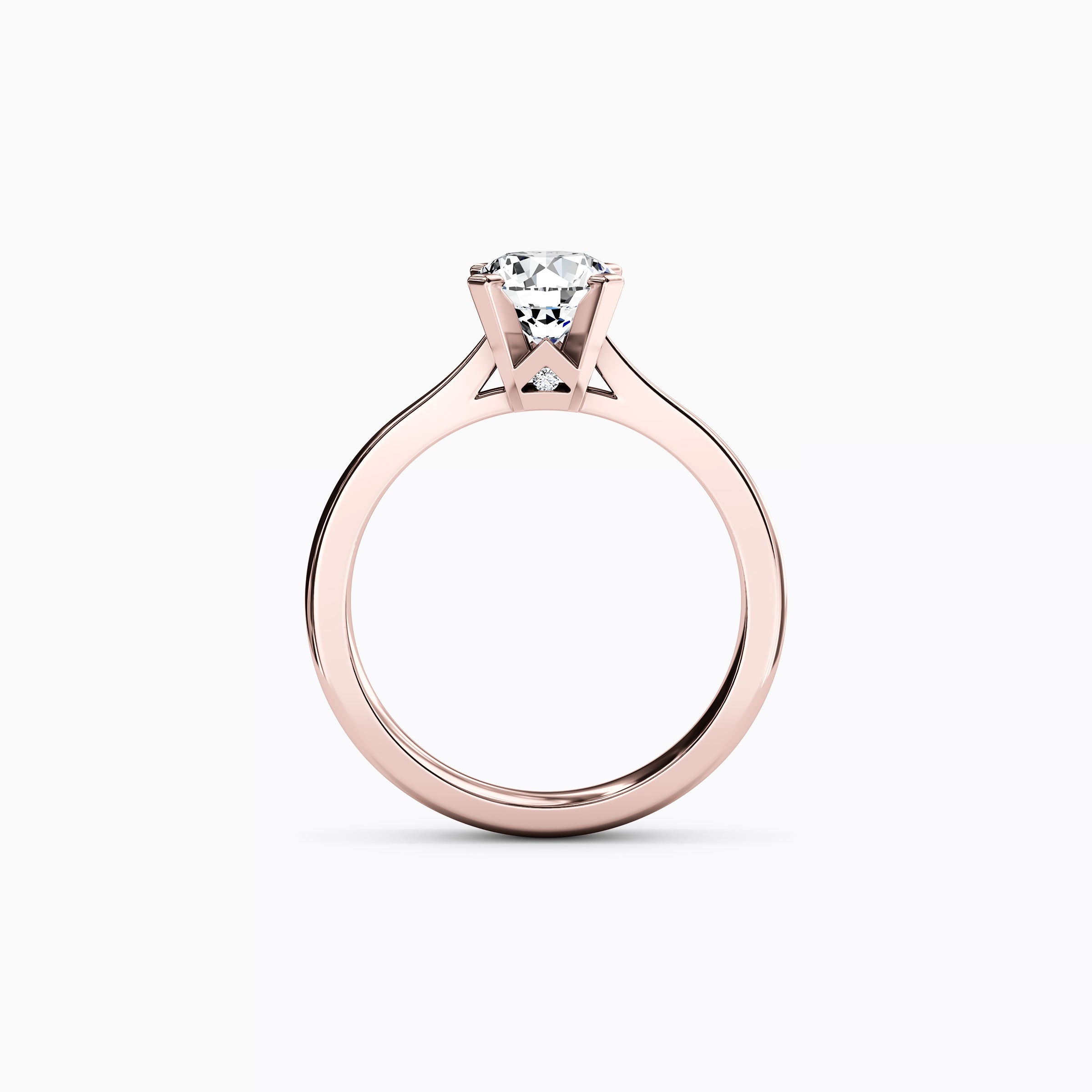 Bague de fiançailles solitaire en or 18 carats avec diamant rond.