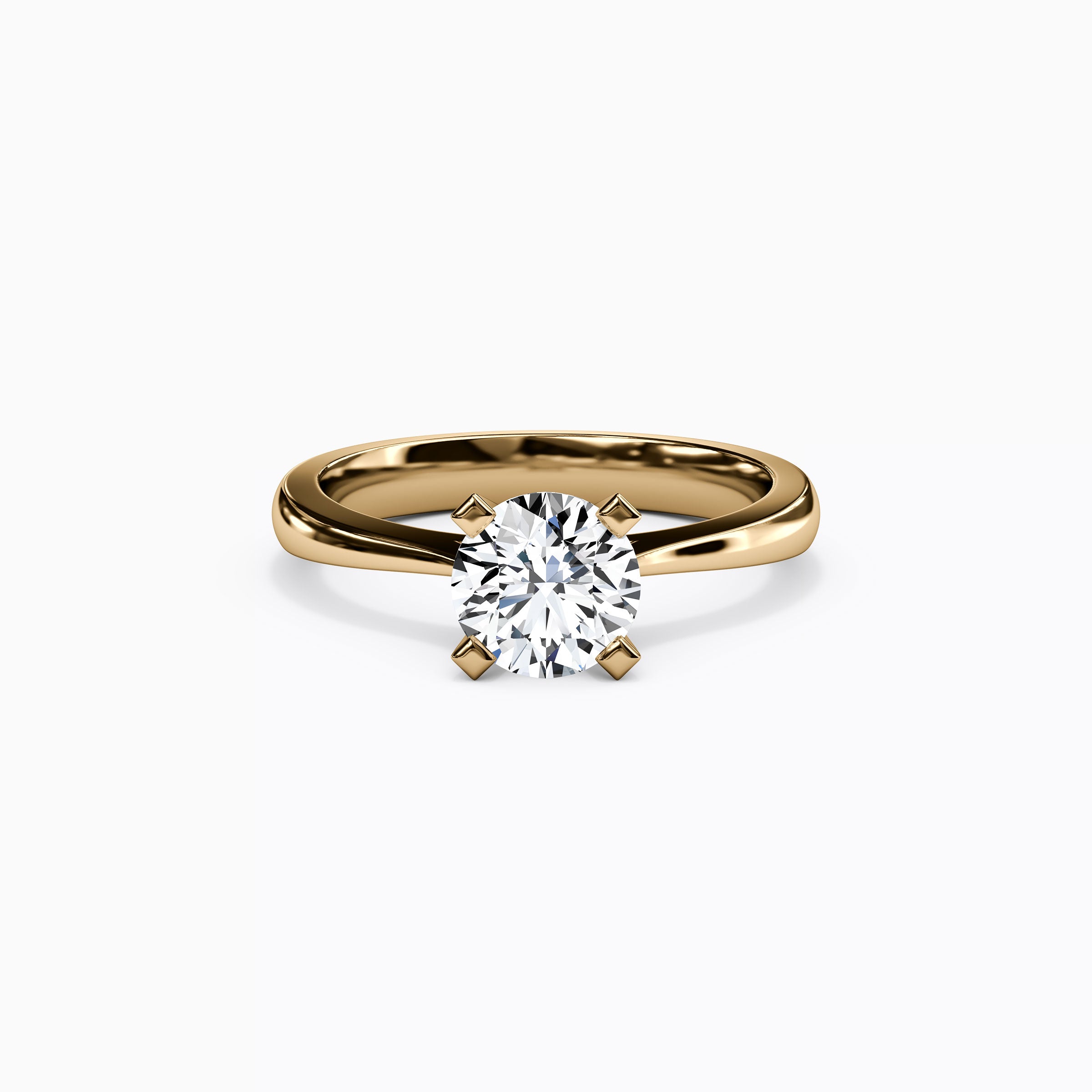 Bague de fiançailles solitaire en or 18 carats avec diamant rond.