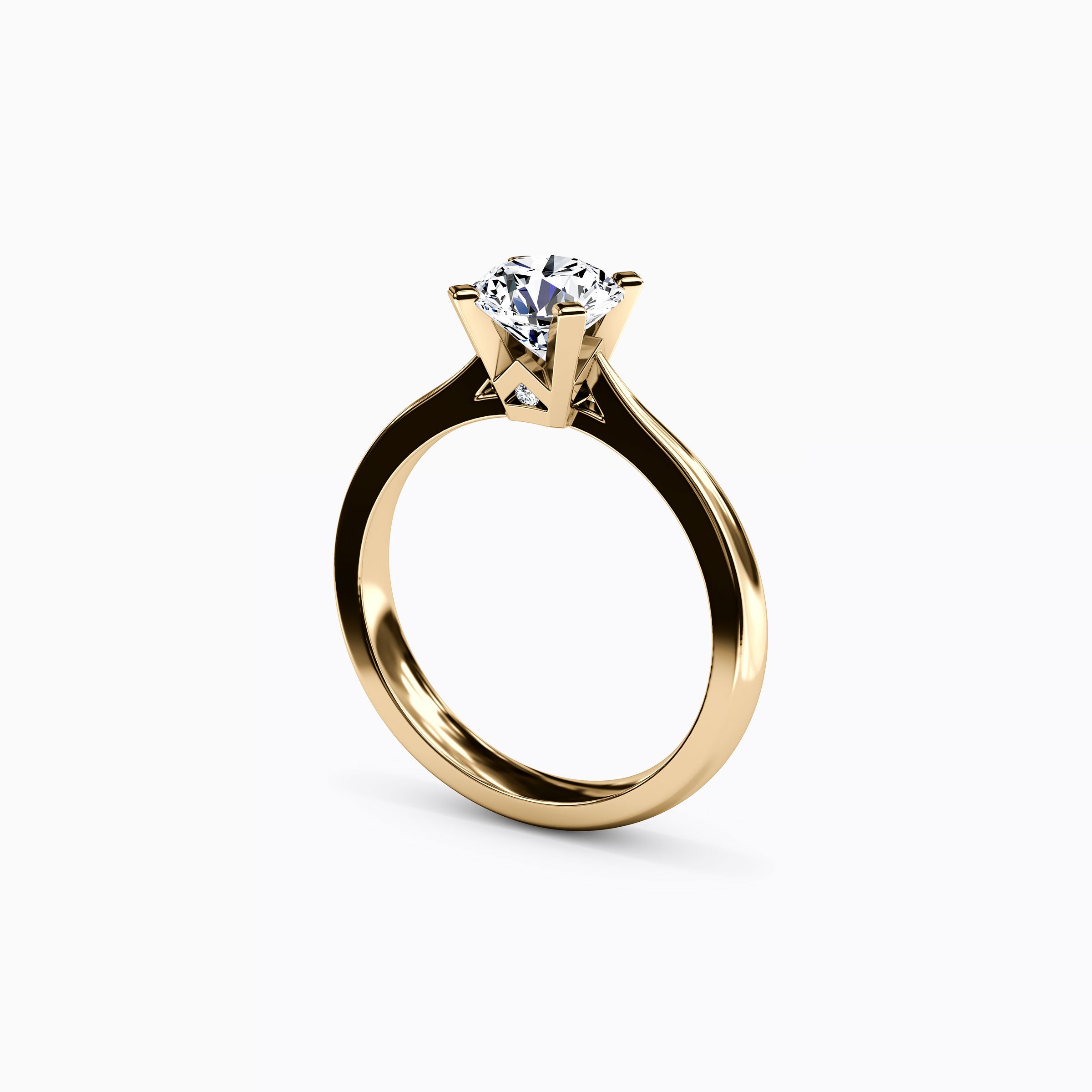 Bague de fiançailles solitaire en or 18 carats avec diamant rond.