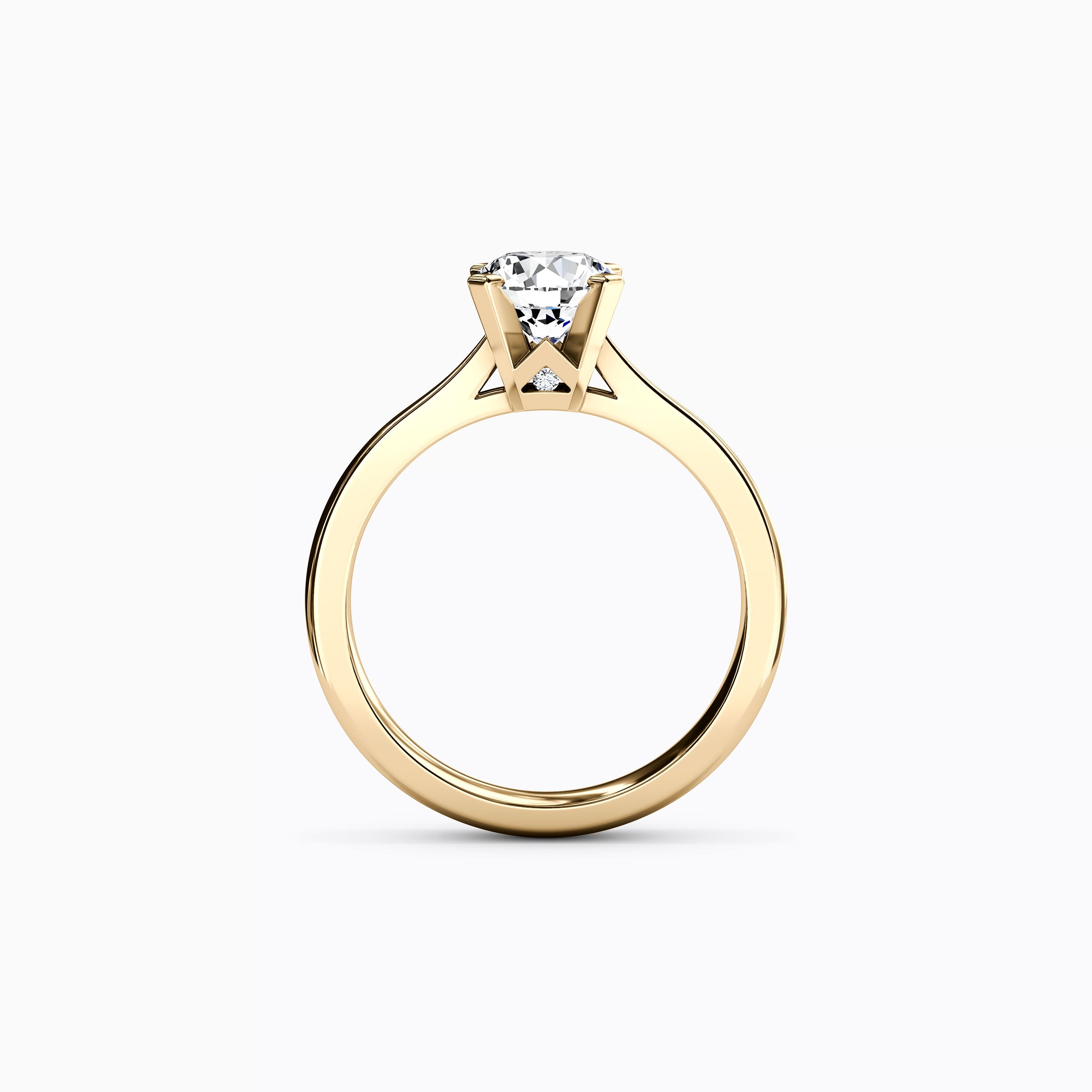 Bague de fiançailles solitaire en or 18 carats avec diamant rond.