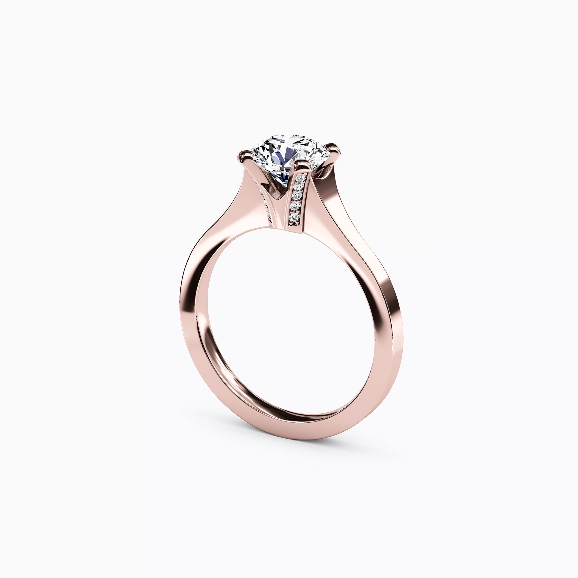 Bague de fiançailles solitaire en or 18 carats, sertie d'un diamant pavé et à monture conique.