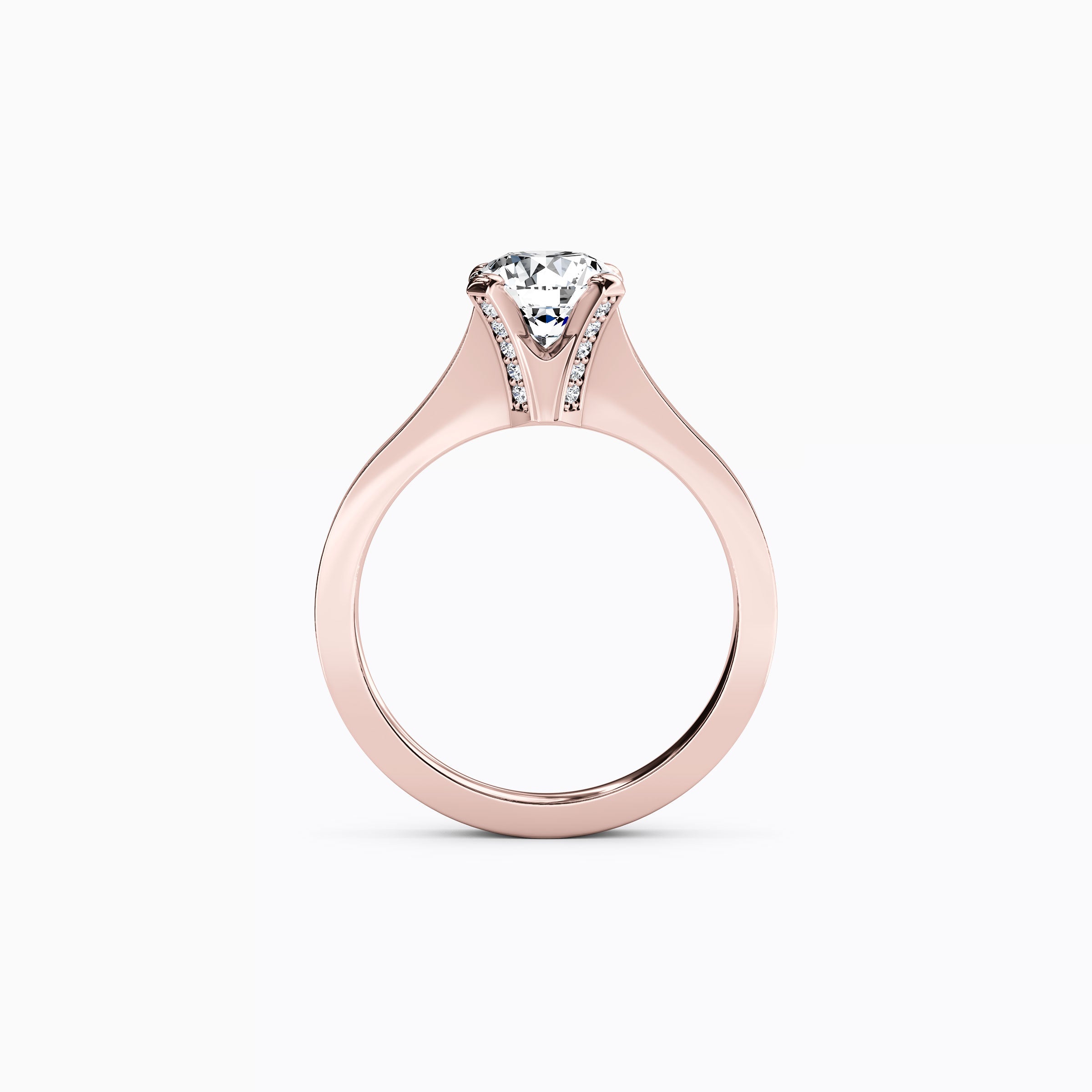 Bague de fiançailles solitaire en or 18 carats, sertie d'un diamant pavé et à monture conique.