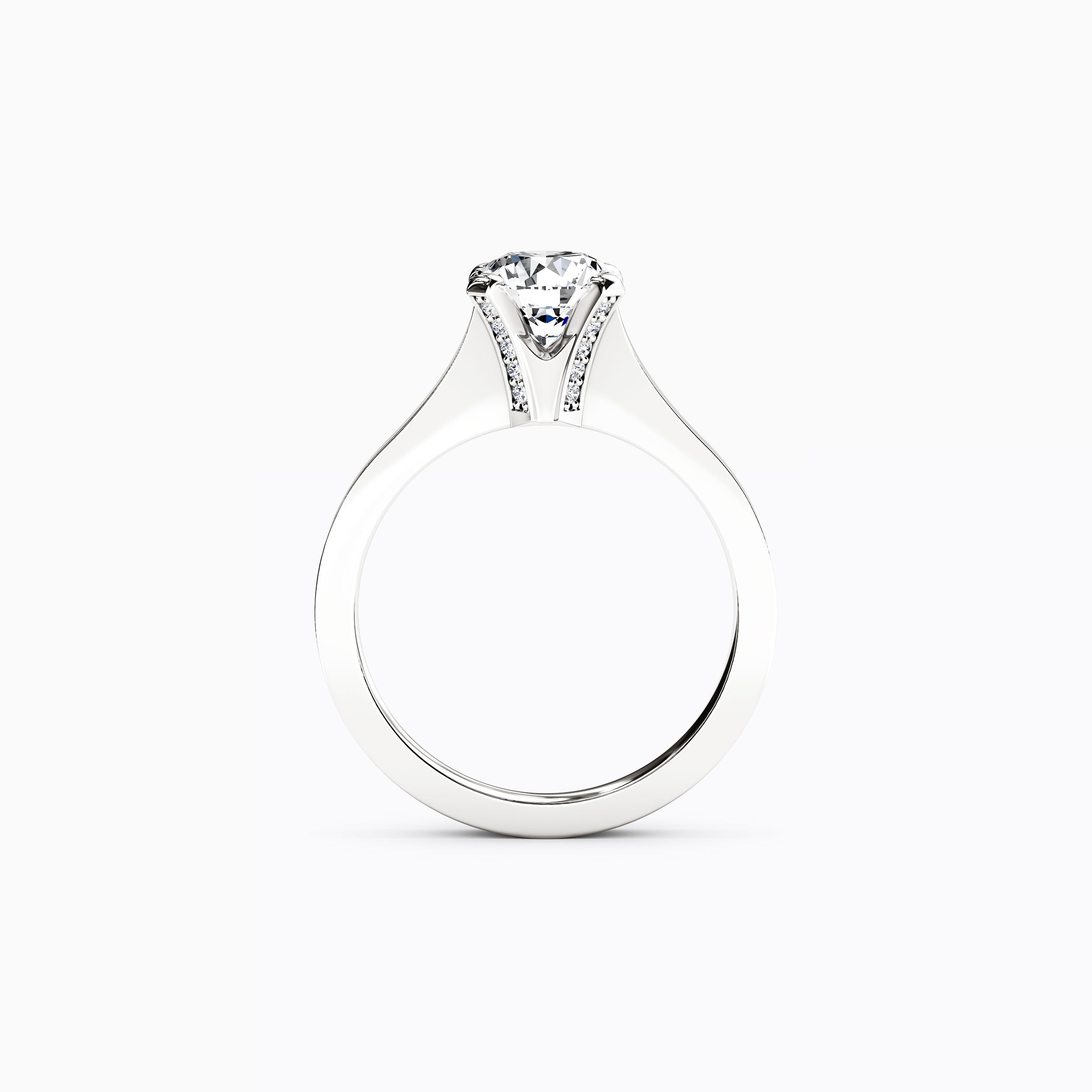 Bague de fiançailles solitaire en or 18 carats, sertie d'un diamant pavé et à monture conique.