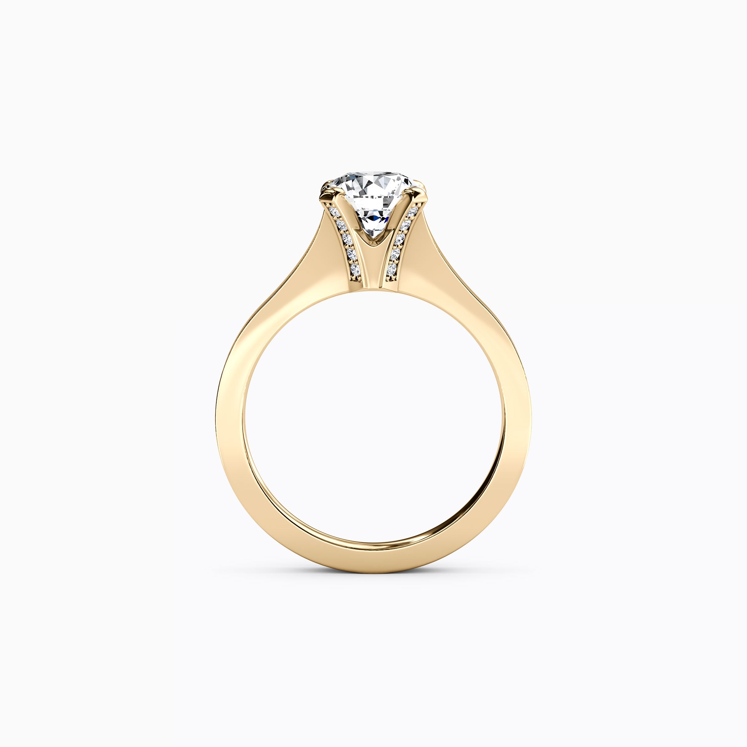 Bague de fiançailles solitaire en or 18 carats, sertie d'un diamant pavé et à monture conique.